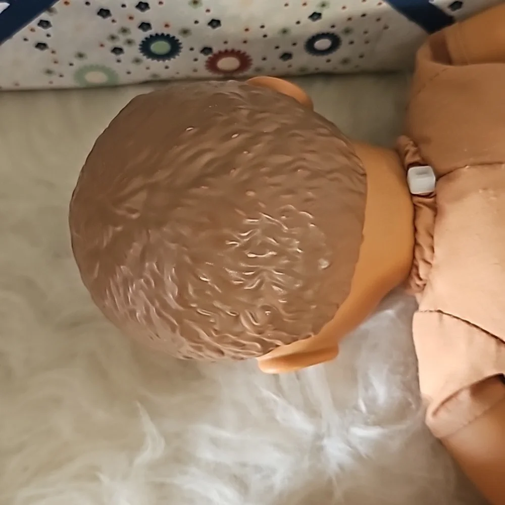 2 cute soft body dolls blonde hair and dark